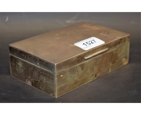 A silver cigarette box, engine turned top