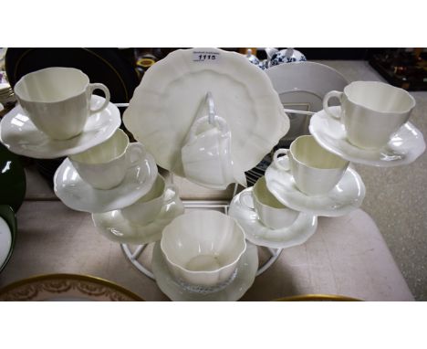 A Royal Crown Derby six-setting tea service, comprising teacups, saucers and tea plates, bread plate, milk jug and sugar bowl