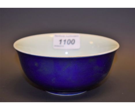 A blue porcelain bowl, light blue interior, character marks to base, 13cm diameter
