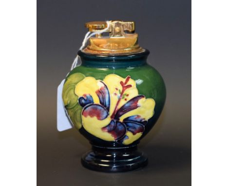 A Moorcroft hibiscus pattern table lighter, 11.5cm high