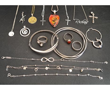 GOOD SELECTION OF SILVER JEWELLERYincluding a Russian wedding band style triple entwined bangle, a CZ set bangle, three rings