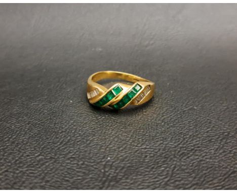 EMERALD AND DIAMOND DRESS RINGthe two central diagonal rows of square cut emeralds flanked by channel set diamonds, on eighte