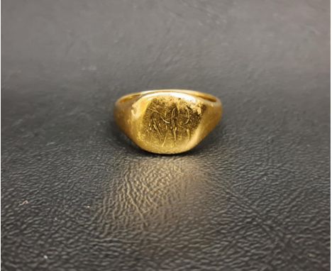 EIGHTEEN CARAT GOLD SIGNET RINGwith now worn and indistinct engraved initials, ring size U and approximately 10 grams 