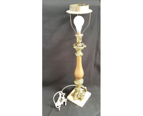 INTERESTING COLUMN TABLE LAMP the bronze dog and putti on white square marble base, with further foliate and scroll work, bas