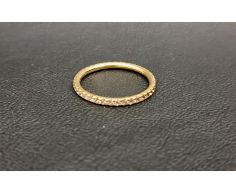 DIAMOND ETERNITY RINGthe thirty-nine diamonds totalling approximately 0.8cts, in eighteen carat gold, ring size S-T and appro