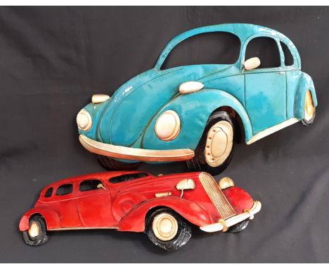 TWO METAL CAR WALL PLAQUES comprising a blue Beetle, 80 x 52cm; and a red vintage car, 70 x 35cm (2) 
