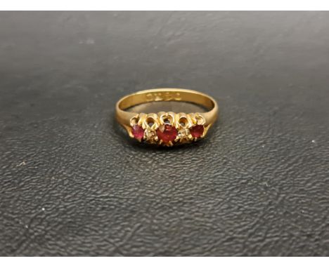 RUBY AND DIAMOND FIVE STONE RINGon eighteen carat gold shank, ring size P and approximately 3 grams 