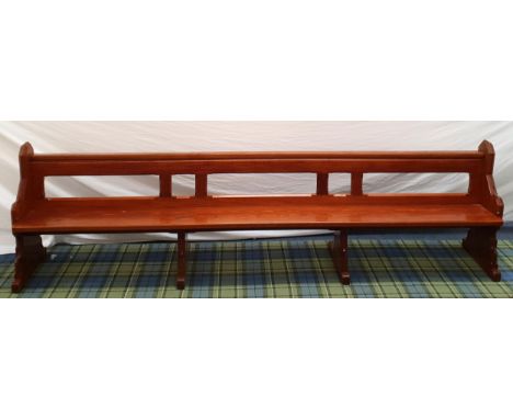 LARGE HEAVY OAK ARTS AND CRAFTS STYLE CHURCH PEWSwith shaped ends and shelf under seat to rear, 304 x 85 x 46cm 
