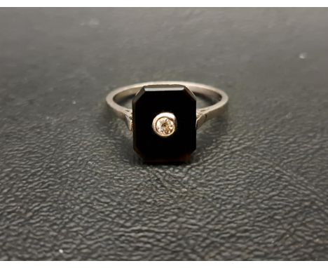 ART DECO DIAMOND AND BLACK AGATE DRESS RINGthe central bezel set diamond approximately 0.07cts, on unmarked platinum shank, r