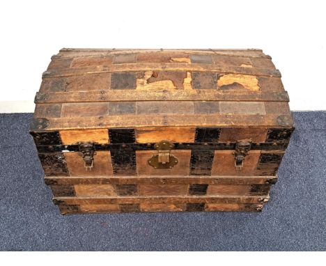 VINTAGE DOMED TOP TRAVEL TRUNK with steel bands, the interior with fitted tray, letter holder and various compartments, on ca