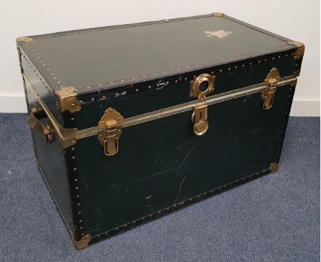 20th CENTURY STEAMER TRUNKin dark green with brass fittings and studs, with interior shelf and with leather handles, 84 x 54 