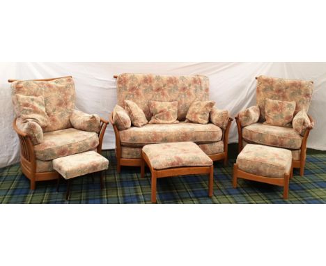 ERCOL RENAISSANCE ELM FOUR PIECE SUITE, comprising two seater settee, pair of armchairs, upholstered foot stool, together wit