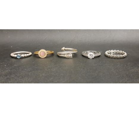 FIVE FASHION RINGSincluding three Pandora silver rings - March Beaded birthstone, Wrap-around arrow, and a flower eternity; t