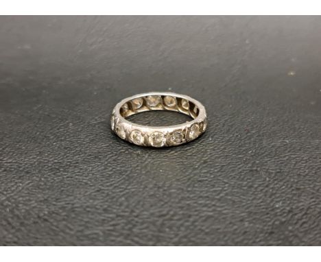 IMPRESSIVE DIAMOND ETERNITY RINGeach of the fifteen round cut diamonds approximately 0.12cts (1.8cts in total), in unmarked g