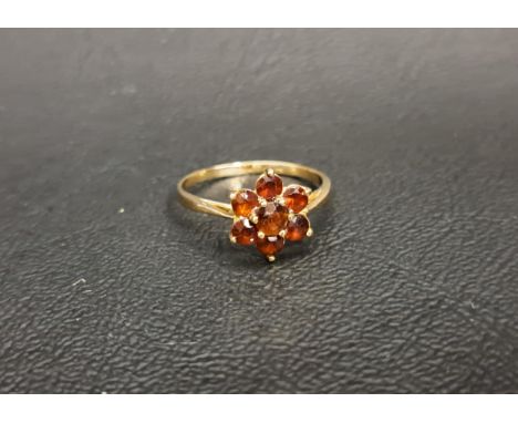 GARNET CLUSTER RINGon unmarked gold shank, ring size L 