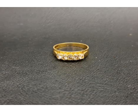 DIAMOND FIVE STONE RINGfour of the diamonds totalling approximately 0.4cts (the other with damage), on eighteen carat gold sh