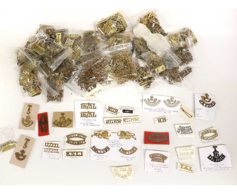 A Large Quantity of Military Shoulder Titles, in brass, staybrite and white metal, including 3rd Dragoon Guards, Army Service