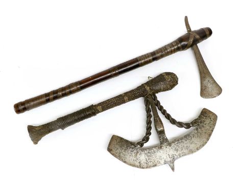 An Early/Mid-20th Songye Kilonda (Ceremonial Axe), DRC, the wrought iron blade worked with human faces to the central spoke, 