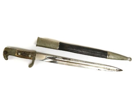 A Second World War German Police Dress Bayonet, the 33cm single edge fullered steel blade with maker's mark P.D. LÜNESCHLOSS,