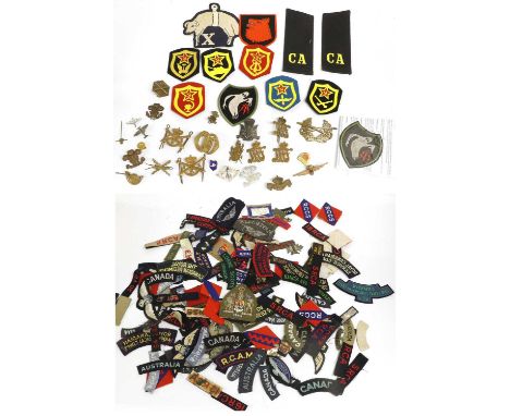 A Quantity of British Colonial Metal Badges, Embroidered and Printed Cloth Insignia, including South Africa metal shoulder ti