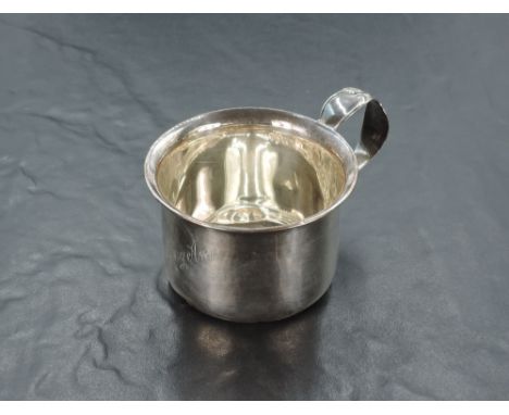 A Canadian Sterling .925 cup, of plain circular form with flared rim and loop handle, the body engraved Mary Ann, marked 'Ste