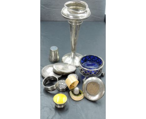 A small lot of sundry silver items, to include dressing jar covers, vase, napkin ring and small circular photograph frame, th