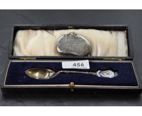 An Edwardian silver vesta case, of kidney shape with foliate engraved decoration, marks for Birmingham 1904, maker William Ha