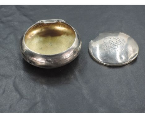 An Edwardian silver snuff box, of circular form, the cover with engraved ownership initials, marks for Birmingham 1905, maker