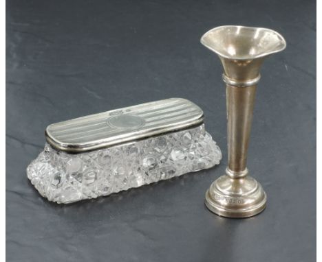 A small Elizabeth II silver trumpet form spill vase, marks for Birmingham 1977, maker Joseph Gloster Ltd, 10cm, 35grams (weig