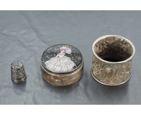 A George V silver cosmetic/sold perfume case, of circular form, the top with painted and butterfly wing decoration, the inter