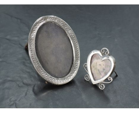 A small Victorian silver photograph frame of heart form having wire decoration and silver easel back, Birmingham 1898, maker 