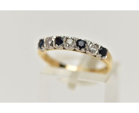 AN 18CT GOLD SAPPHIRE AND DIAMOND RING, half eternity style ring, set with four circular cut deep blue sapphires, interspaced