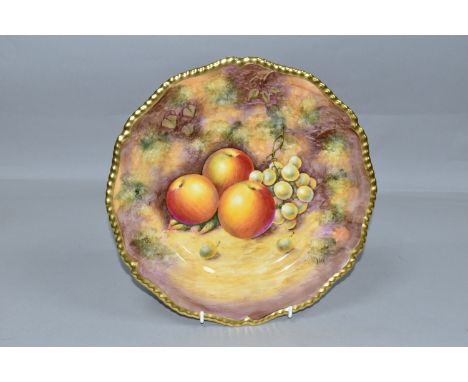 A ROYAL WORCESTER FRUIT STUDY PLATE BY R. LEWIS, gilt silver shape and painted with apples and green grapes on a bank, painte