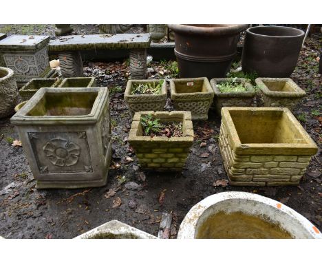 A WEATHERED COMPOSITE SQUARE PLANTER, 39cm squared x height 43cm, along with two brick effect square planters (3)