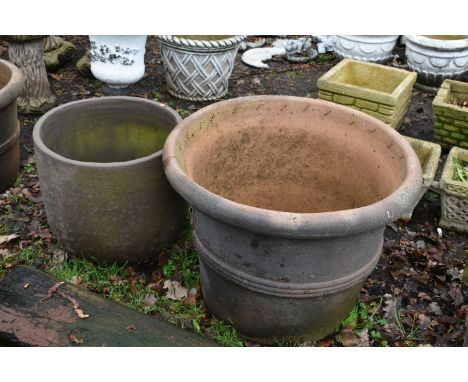 A LARGE WEATHERED TERRACOTTA PLANTER, diameter 72cm x height 57cm, along with another circular planter (2)