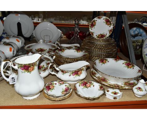ROYAL ALBERT 'OLD COUNTRY ROSES' PATTERN DINNERWARE, comprising two gravy jugs (one marked as second quality, the other has a