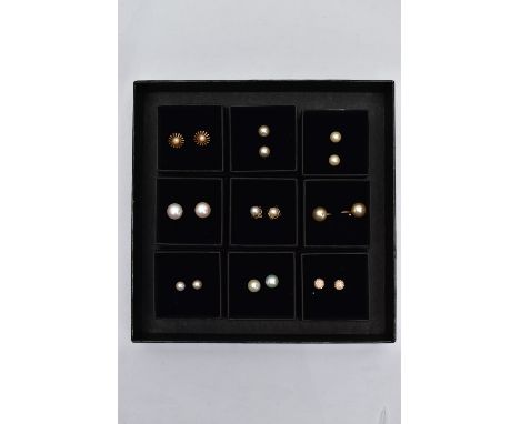 A BOX OF ASSORTED EARRINGS, nine pairs in total, to include seven pairs of cultured pearl stud earrings, each fitted with yel