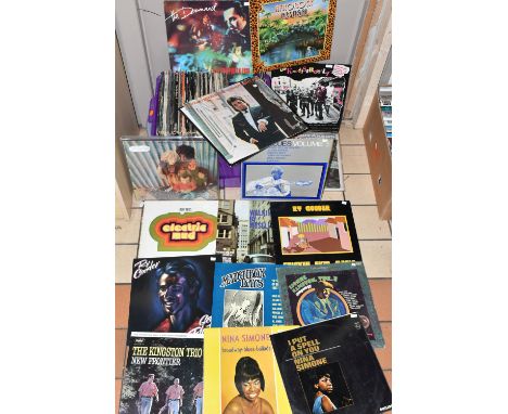 A box CONTAINING OVER SEVENTY LPs OF ROCK, BLUES AND PUNK MUSIC including Band of Gypsies by Hendrix Band (puppet sleeve VG/V