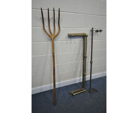A HAY FORK, along with a brass fender (losses) and a brass wall mounted pole (3)
