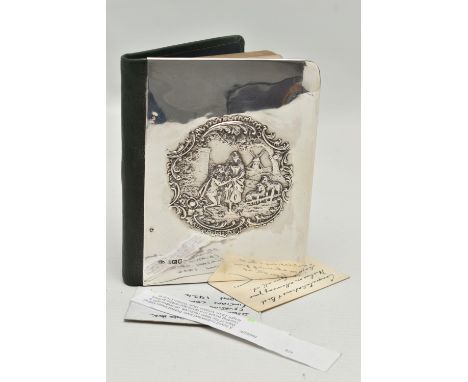 A EDWARDIAN WILLIAM COMYNS &amp; SONS SILVER MOUNTED AND GREEN LEATHER BOUND DAYS OF THE WEEK NOTEBOOK, the silver cover repo