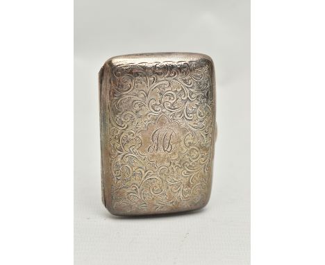 AN EDWARDIAN SILVER CIGARETTE CASE, rounded rectangular form with engraved foliate decoration and monogram to the cartouche, 