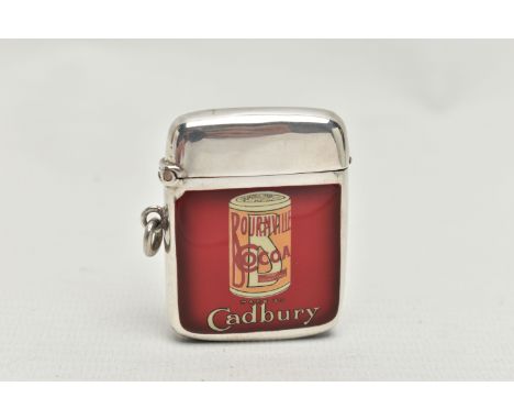 AN EDWARDIAN / GEORGE V SILVER AND ENAMEL VESTA CASE ADVERTISING 'BOURNVILLE COCOA MADE BY CADBURY', of rectangular form, fit