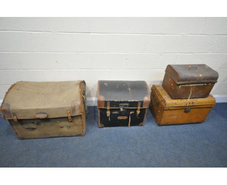 A VINTAGE LEATHER AND CANVAS DOMED STEAMER TRUNK, width 75cm x depth 57cm x height 60cm, another similar smaller steamer trun