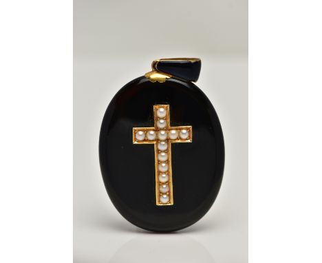 A VICTORIAN ONYX AND SPLIT PEARL MOURNING LOCKET PENDANT, onyx oval form displaying a yellow metal cross set with split pearl