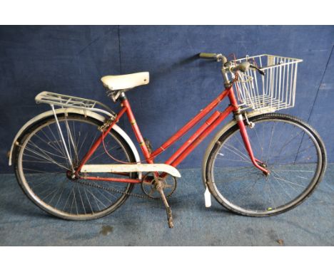 A VINTAGE WOMANS BICYCLE make and model unknown