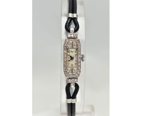 A LADYS DIAMOND SET COCKTAIL WATCH, rectangular white dial, Arabic numerals, blue steel hands, within a single cut diamond ca
