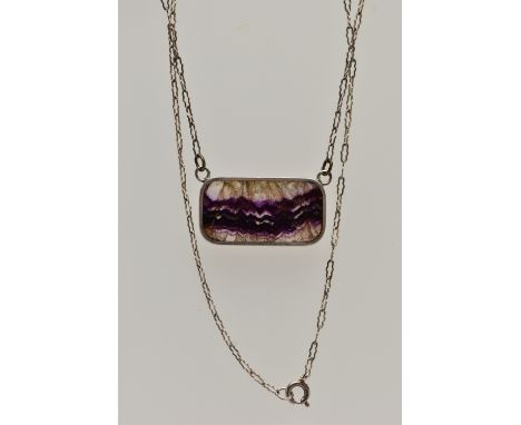 A SILVER BLUE JOHN FLUORITE PENDANT, the blue john fluorite pendant of a rectangular form collet set in a silver mount, hallm