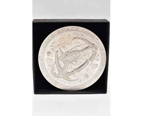 A SILVER STAR TREK MEDALLION, deep space nine premier 1993, with Calander to the reverse, engraved to the rim '1993 Paramount