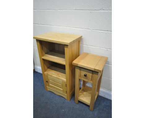 A SLIM LIGHT OAK OPEN BOOKCASE, with a small fielded panel door, width 56cm x depth 38cm x height 99cm, and a light oak telep