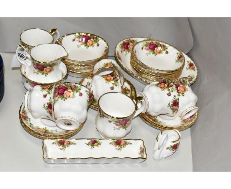 A GROUP OF ROYAL ALBERT 'OLD COUNTRY ROSES' PATTERN TEAWARE, comprising twelve fruit dishes, two mugs, sugar bowl, milk jug, 